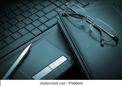 Business Items On Laptop Computer