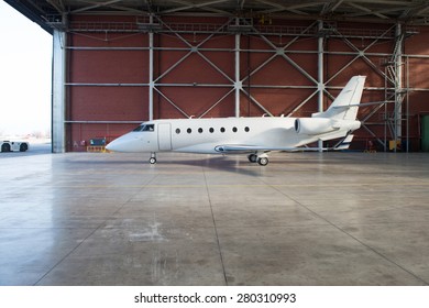 Business Jet Airplane Is In Hangar.