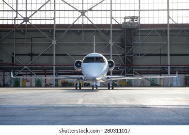 Business Jet Airplane Is In Hangar.