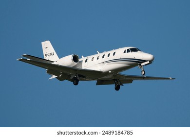 Business jet landing in Amsterdam in Netherlands - Powered by Shutterstock