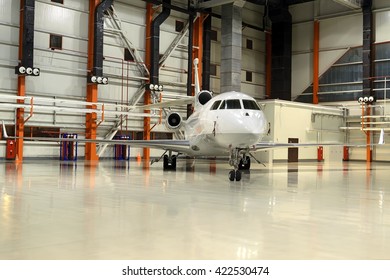 Business Jet Parked In The Hangar