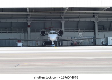 Business Jet In A Plane Hanger At The Airport