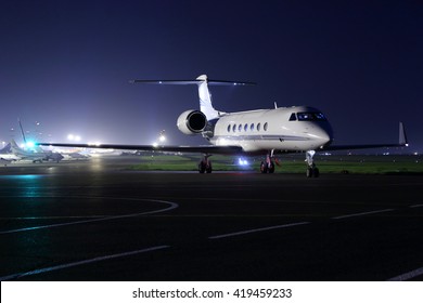 Business Jet Starting Up At Night.