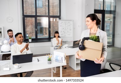 Business, Job And Quit Concept - Happy Smiling Colleagues Applauding To Female Office Worker