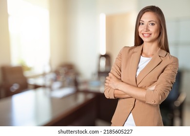 Business Lady Crossed Arms Wear Buisness Suit On Office Background