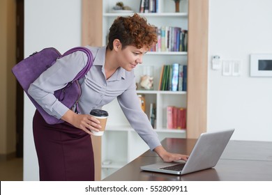 Business Lady Shutting Down Laptop Before Leaving The House