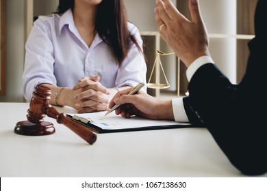 Business law concept, Lawyer business lawyers are consulting lawyers for women entrepreneurs to file a copyright lawsuit.