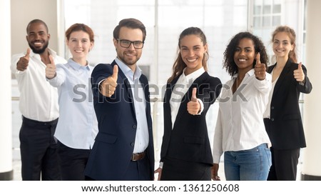 Business leaders with employees group showing thumbs up looking at camera, happy professional multicultural office team people recommend best corporate service, proud or good career, human resource