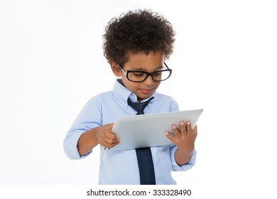 business little boy holding a tablet isolated on white background - Powered by Shutterstock