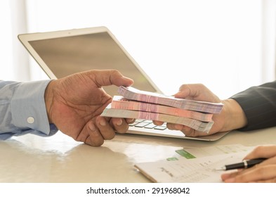 Business loan from a bank employee. finance concept - Shutterstock ID 291968042
