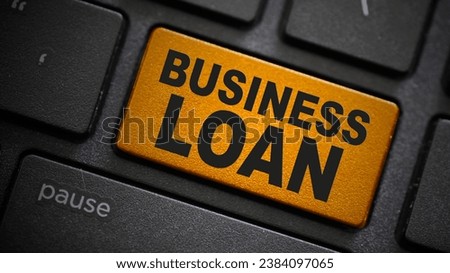Business loan text button on computer keyboard