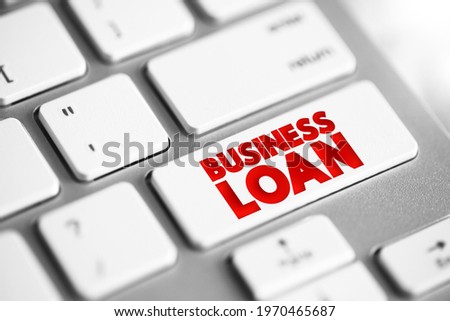 Business Loan - type of financing provided by a financial institution to a business entity for various purposes related to the business, text concept button on keyboard