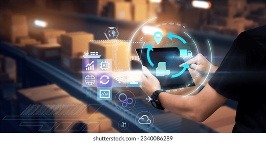 Business Logistics technology concept.Man hands using tablet on blurred warehouse as background - Powered by Shutterstock