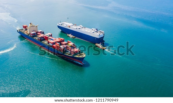 business luxury ship loading cars and\
shipping cargo containers logistics export import service open sea\
asia pacific and europe zone aerial view from\
drone