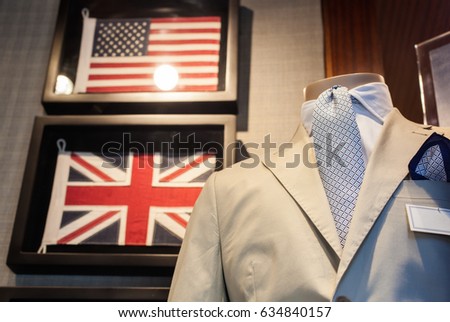 Business male suit on shop mannequins high fashion retail display
