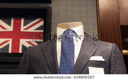 Business male suit on shop mannequins high fashion retail display
