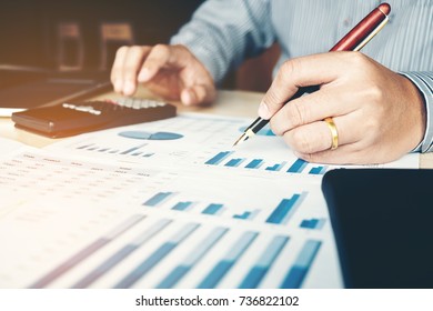 Business man Accounting Calculating Cost Economic - Shutterstock ID 736822102