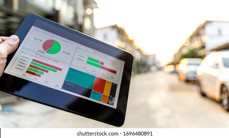 Business man analysis graph visualization on mobile for anywhere anytime