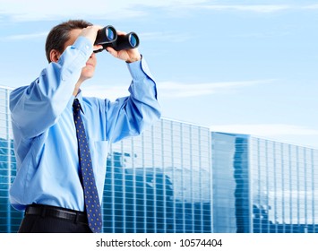 business man  with binoculars looking to the future - Powered by Shutterstock