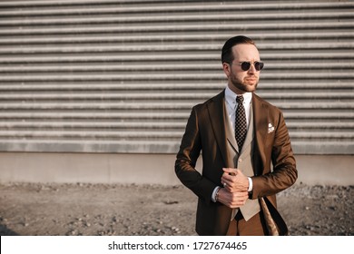 brown suit groom