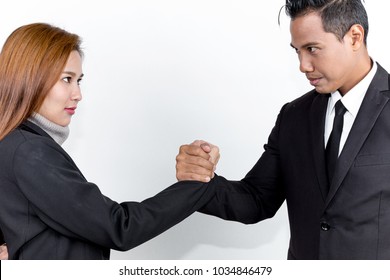 Business Man And Buisness Woman Fighting To Do Business.