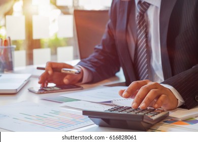 Business Man Calculating Budget Numbers, Invoices And Financial Adviser Working.