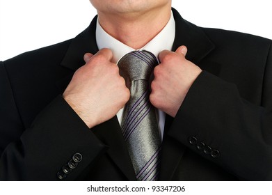 Business Man Checking His Tie Knot With His Hand