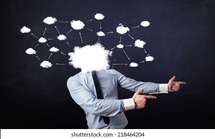 Business man with cloud network head on grungy background - Shutterstock ID 218464204