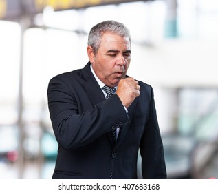 Business Man Coughing