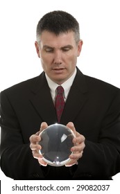 Business Man With Crystal Ball Looks For Guidance