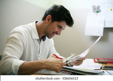 Business Man Cutting Paper In Office. 