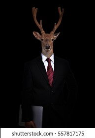 Business Man With Deer Head In The Dark