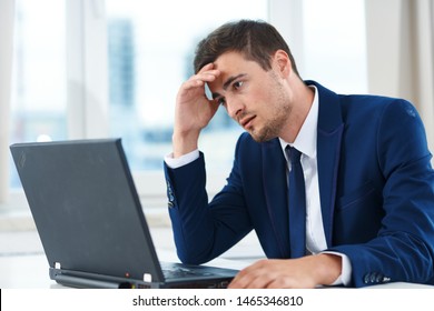 Business man desktop laptop finance headache loan - Shutterstock ID 1465346810