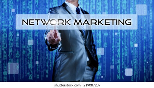 Business Man With Digital Background Pressing On Button Network Marketing