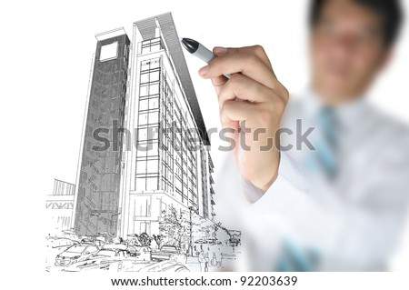 Business man draw building