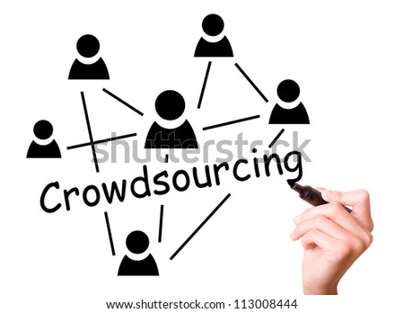 Business man drawing crowd sourcing concept to screen.