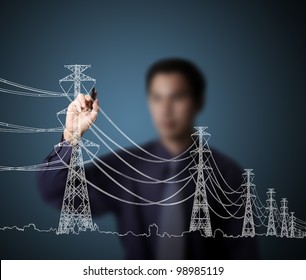 business man drawing industrial electric pylon and wire