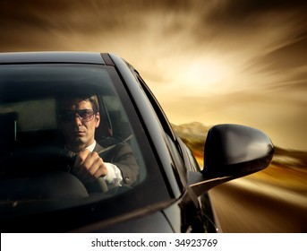 Business Man Driving A Car