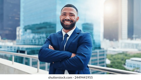 Business man, face and arms crossed, lawyer happy with career and confident on rooftop, skyscraper and pride. Expert, legal employee or attorney with smile in portrait for corporate and professional - Powered by Shutterstock