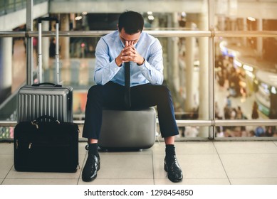 Business man failed to feeling hopeless, distraught, sad and discouraged in life. Concept there are mistakes in travel and businessplanning.
