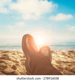 Business Man Feet Relaxing At The Beach