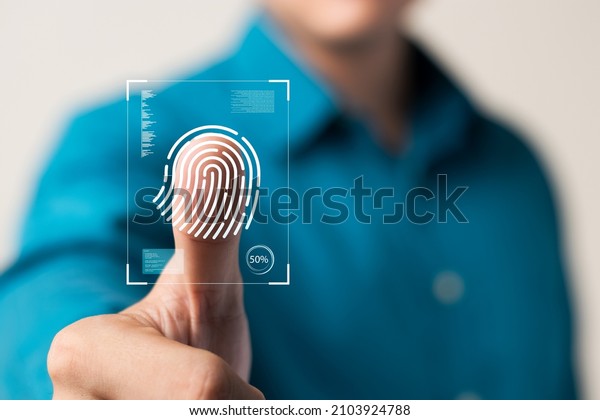 business man Fingerprint scanning and\
biometric authentication, cybersecurity and fingerprint password,\
future technology and\
cybernetics.