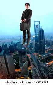 Business man flying over a city