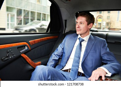 Business Man Goes To The Executive Car