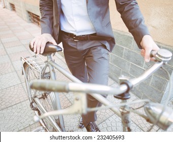 Business Man Going To Work On His Bicycle. Concept About Healthy Lifestyle