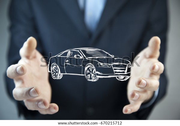 Business man hand  car\
in screen background