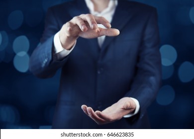 Business Man Hand Holding On Bokeh Background 