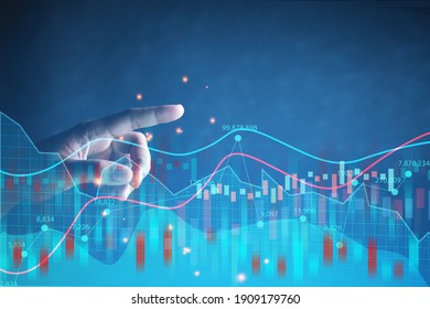 Business man hand pointing Stock market graph shows business people the rise in stock market and financial investment.