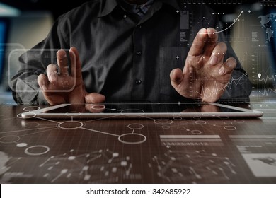 business man hand working on digital tablet computer with layer strategy and social media diagram on wooden desk - Shutterstock ID 342685922