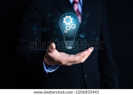 Business man Hands holding light bulb for Concept new idea concept with innovation and inspiration,inovation concept 